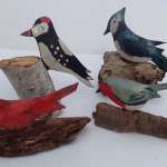 Raku birds on driftwood