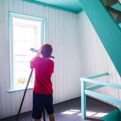 Boy  With Telescope in Lighthouse, Manitoulin Island