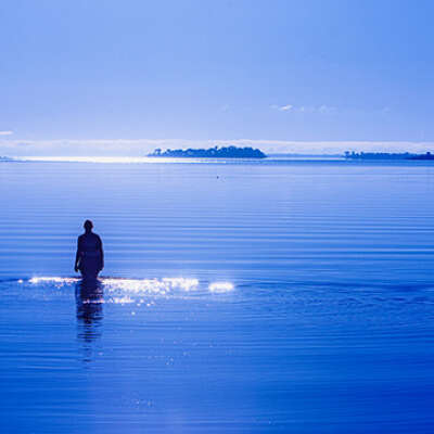 Woman, early morning swim, Manitoulin Island