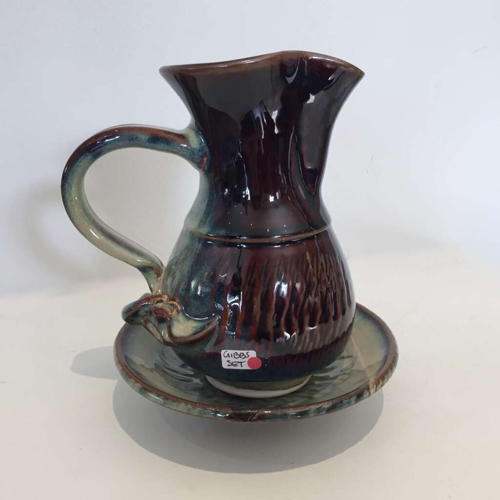 jug on dish dark side