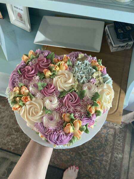 10" heart cake. Buttercream florals.